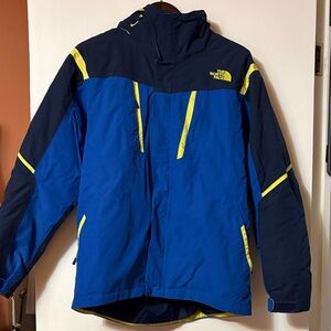 The North Face Blue, Navy and Yellow Jacket with zip out loner. Size small.